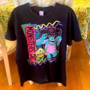 Monsters Inc. Size large black T-shirt.